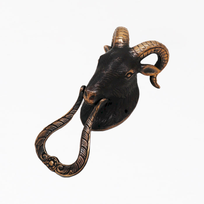 Grand heurtoir en forme de tête de chèvre