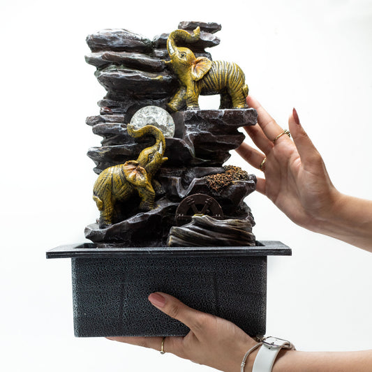 Fontaine d'intérieur - Éléphants, boule de cristal et roue à eau 35 cm