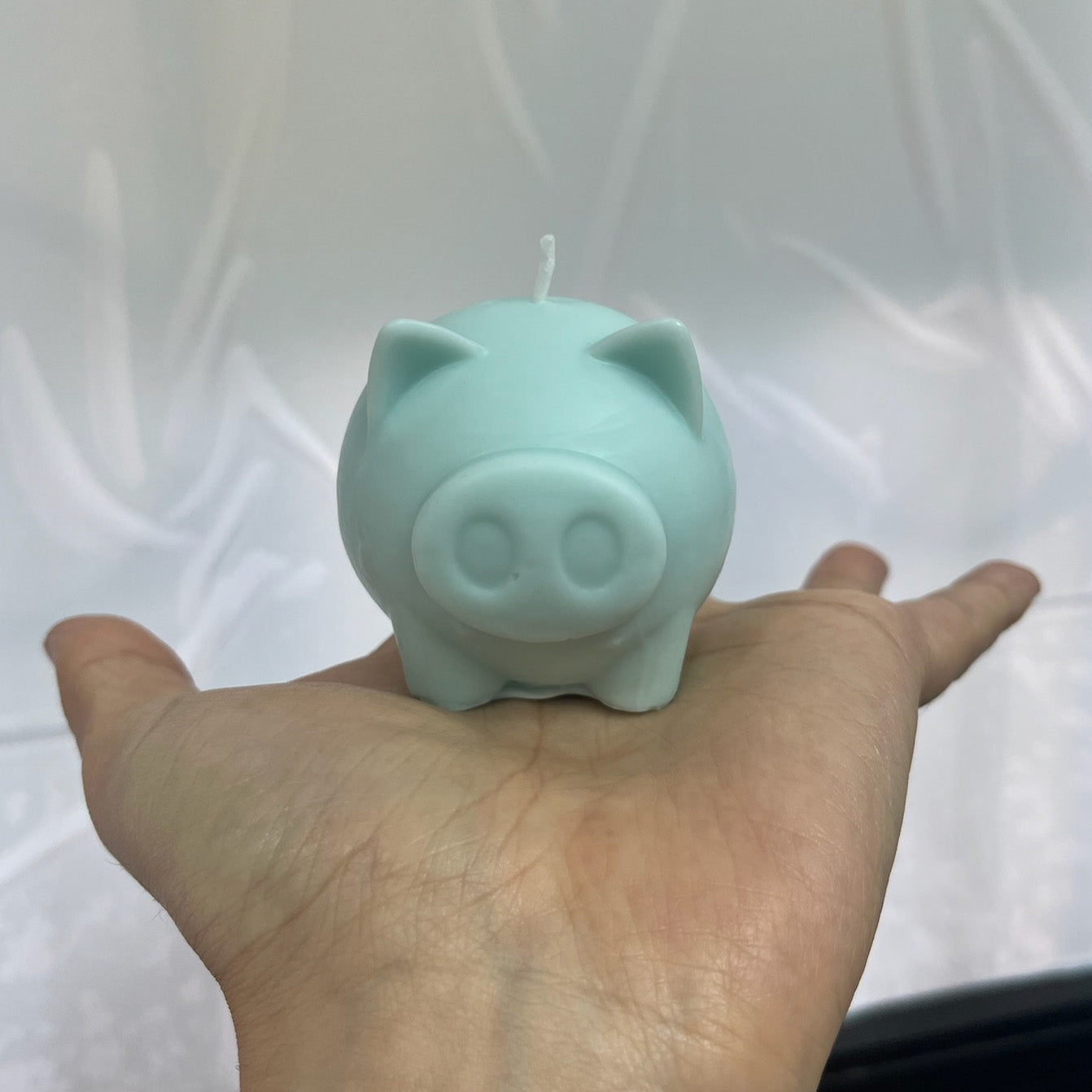 Schweinchenkerzen