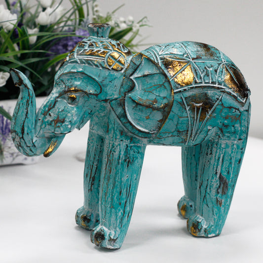 Geschnitzter Elefant aus Holz - Türkisgold