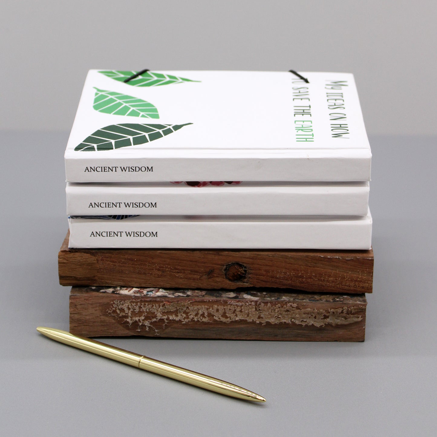 Kleines Notizbuch mit Riemen - Blätter am selben Baum