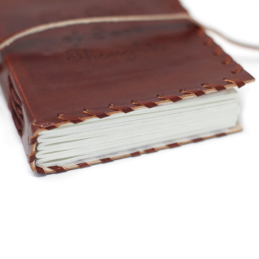 Leder-Notizbuch mit Gedankennotizen