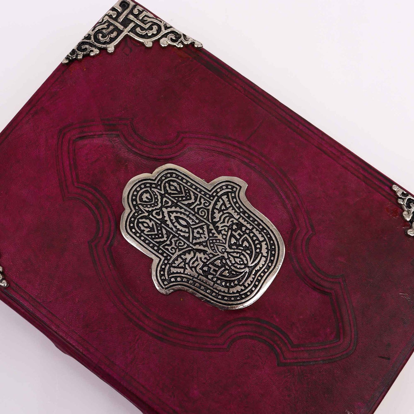Buch aus Rotbronze – Hamsa-Dekoration aus Zink mit Einbandkanten
