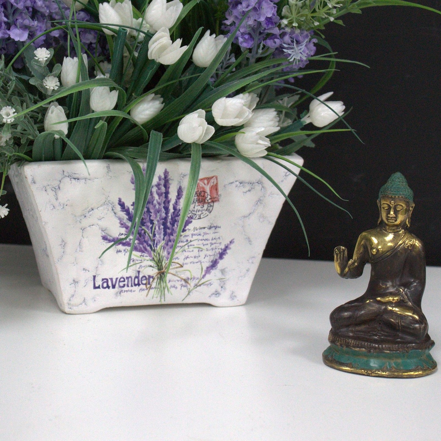 Mini Bouddha assis avec la main levée