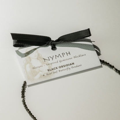 Collar de gema de obsidiana negra ninfa con colgante de mariposa hecho de una hoja real