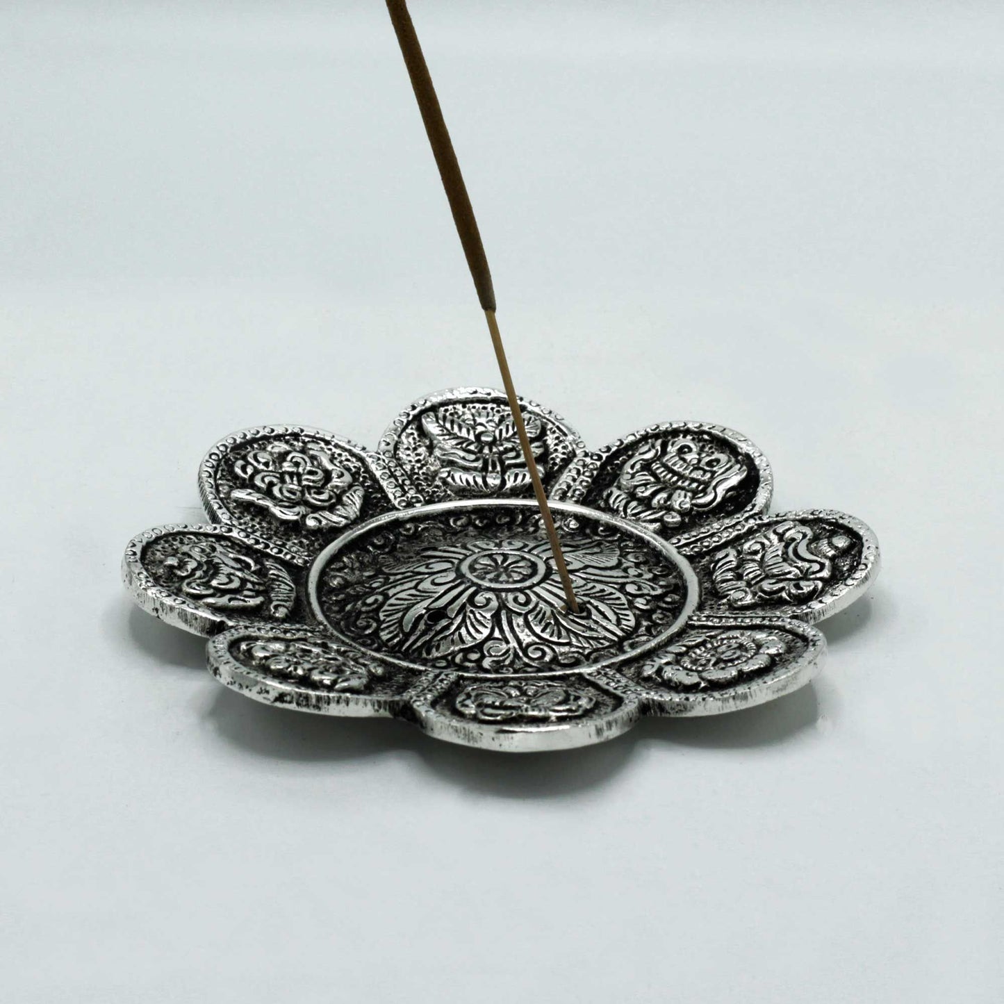 Porte-encens symboles tibétains en aluminium poli 12 cm