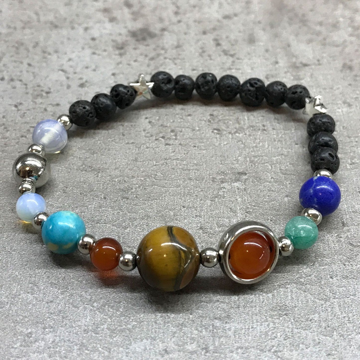 Pulsera Piedra Lava Sistema Solar Plata