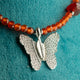 Collar de gema de rubí Nymph con colgante de mariposa hecho con una hoja real