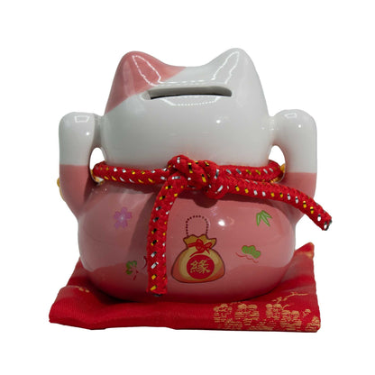 Tirelire en céramique en forme de chat porte-bonheur - rose sur coussin