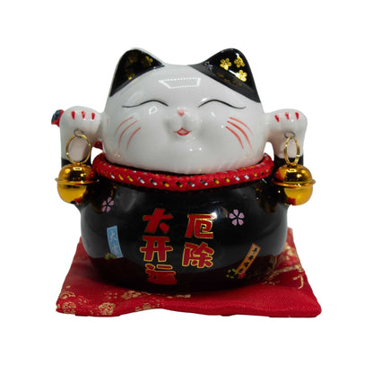 Tirelire en céramique chat porte-bonheur - Noir sur coussin