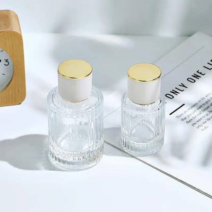 Frascos de vidrio para perfume con pulveridaor y tapa azul 30 ml