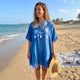 Nomad Sari en la Colección Med - Kaftán - Azul con bordado en crema y borlas
