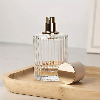 Flacons de parfum en verre avec vaporisateur et bouchon bleu 50 ml